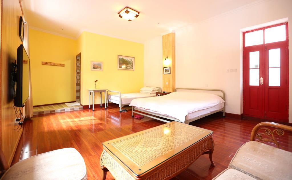 Wheat Youth Hostel Циндао Стая снимка